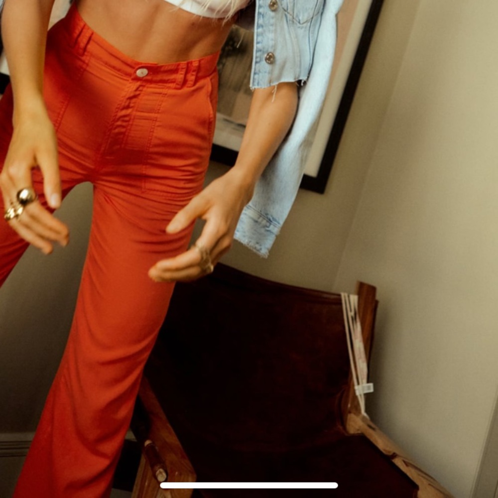Orange pants size L.